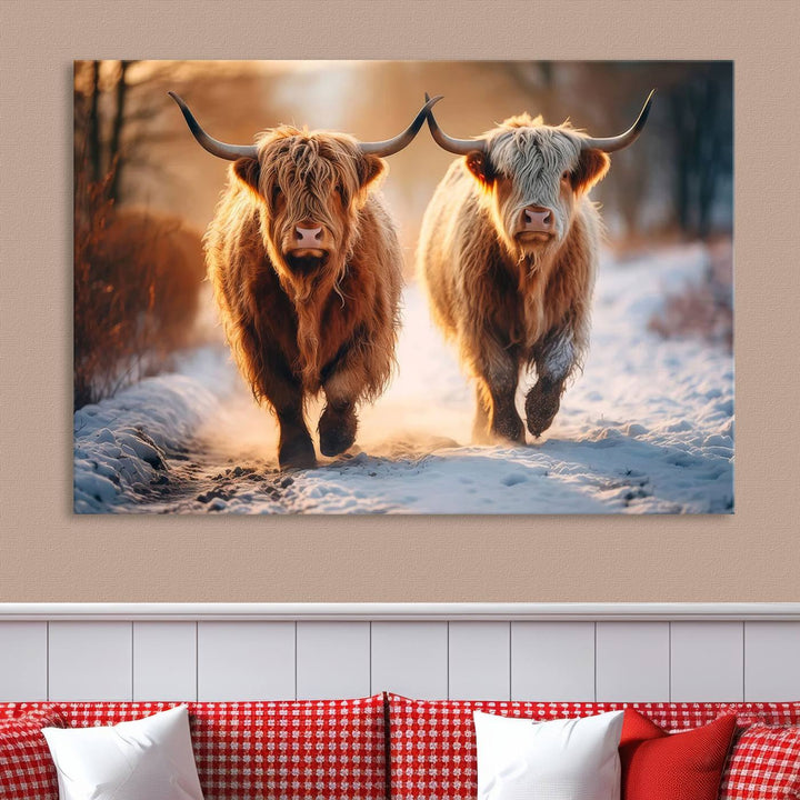 The living room showcases a triptych from the Scottish Highland Cow Horn Farm Wall Art Canvas Print collection, depicting two Highland cows running in the snow. Complementing this are handmade wall art pieces with a gallery-quality finish that add an elegant touch.