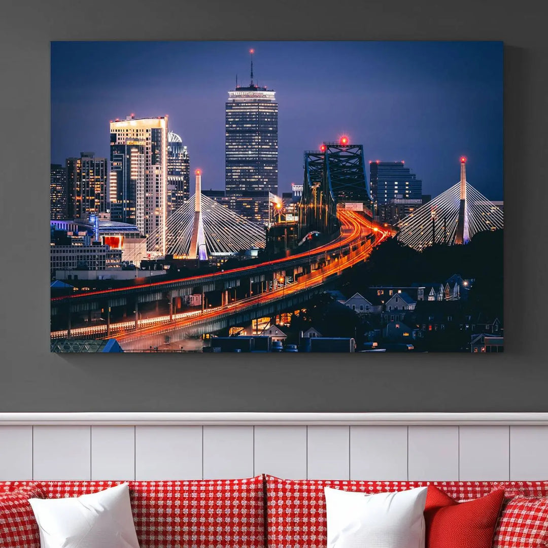 The "Boston City Lights Night Skyline Cityscape View" artwork on the wall showcases a brightly lit bridge at night. It is displayed on museum-quality canvas with a UV-protective coating.