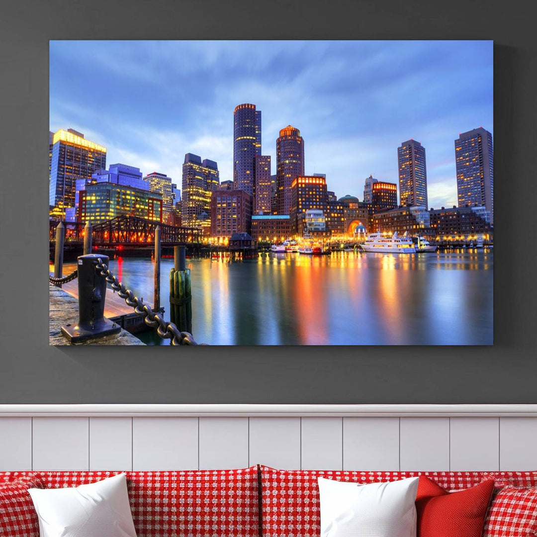 The Boston City Lights Sunset Cloudy Blue Skyline Cityscape View Wall Art Canvas Print embellishes a contemporary living room. This gallery-wrapped canvas set guarantees museum-quality canvases to enhance any space.