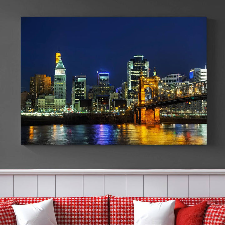 The "Cincinnati City Lights Night Skyline Cityscape" canvas print, displayed above a sofa, exhibits museum-quality craftsmanship with a UV-protective coating.