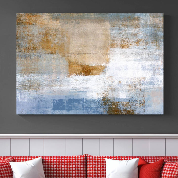 The Blue Multi Panel Abstract Wall Art Canvas Print, featuring an elegant blend of blue, beige, and brown tones, hangs gracefully on the wall, adding a contemporary touch to the space.