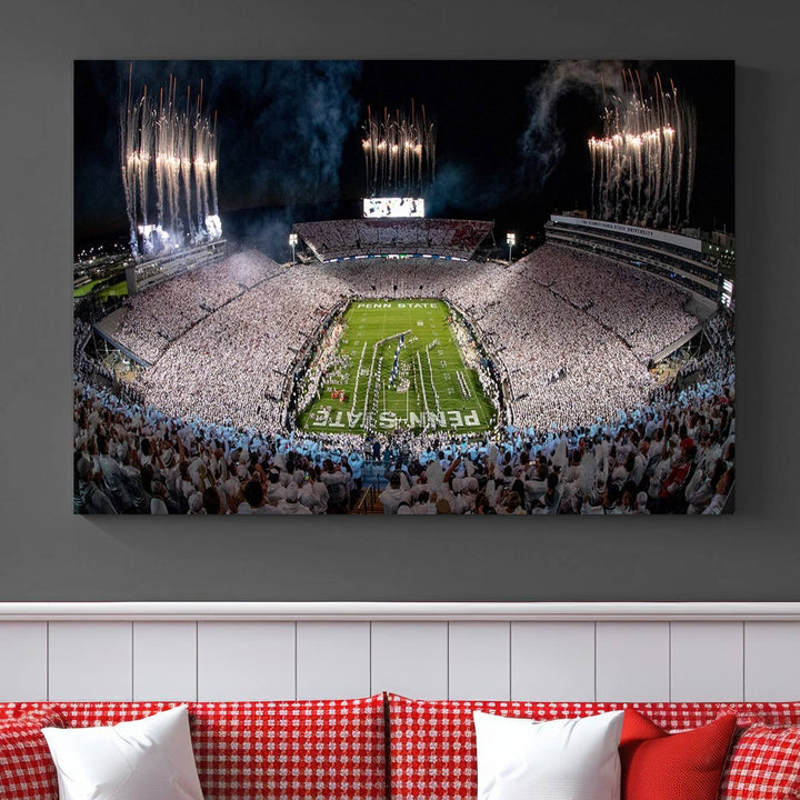 The Penn Stadium Football Wall Art Canvas Print showcases the lively ambiance of a bustling Pennsylvania University football stadium illuminated by fireworks.