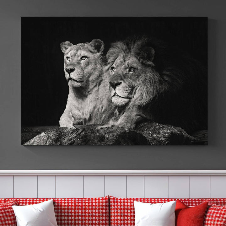 The elegant wildlife portrait, "Lion Couple Canvas Wall Art Print," featuring a black and white depiction of a lion family, majestically decorates the living room wall.