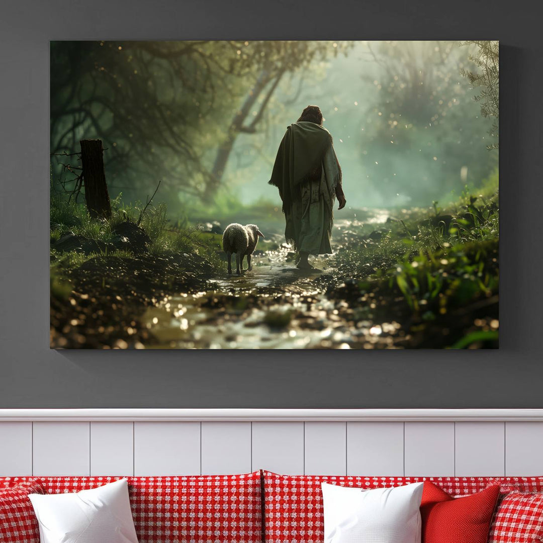 The wall art piece, titled "Jesus Shepherd a Lost Lamb Canvas Wall Art Print," is suspended on the wall and depicts a robed figure and a lamb wandering along a forest path.