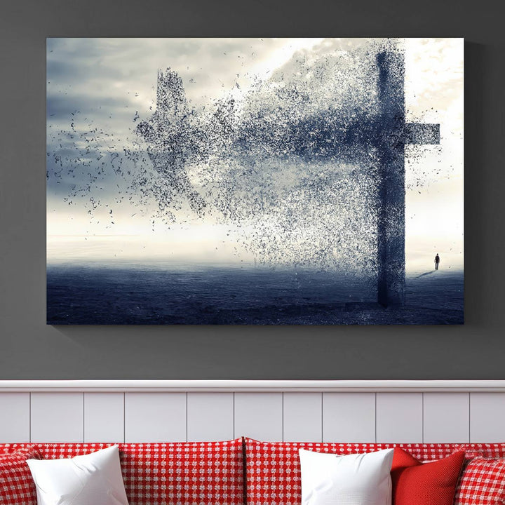 The "Jesus and the Fading Cross – Symbol of Faith" framed canvas print beautifully depicts a cross formed by birds against a moody sky above an ocean. This piece of Christian wall art infuses spirituality into the minimalist space.