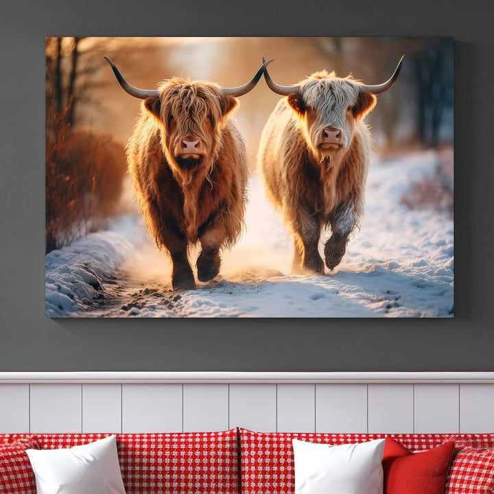 The living room showcases a triptych from the Scottish Highland Cow Horn Farm Wall Art Canvas Print collection, depicting two Highland cows running in the snow. Complementing this are handmade wall art pieces with a gallery-quality finish that add an elegant touch.