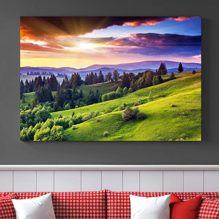 The room features a large triptych of the Green Hills and Sunset Wall Art Print, showcasing a scenic landscape with lush greenery and a vibrant sky.