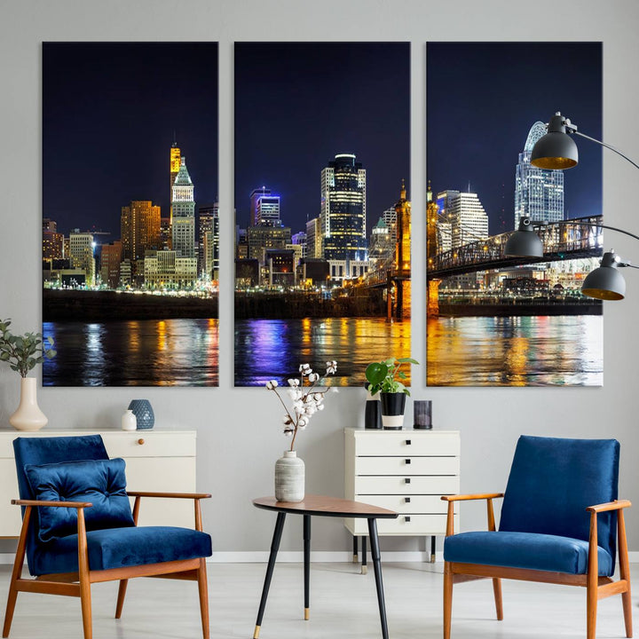 The Cincinnati City Lights Night Skyline Cityscape View Wall Art Canvas Print, crafted on museum-quality canvas with UV-protective coating and ready to hang, adds a touch of sophistication to the wall.