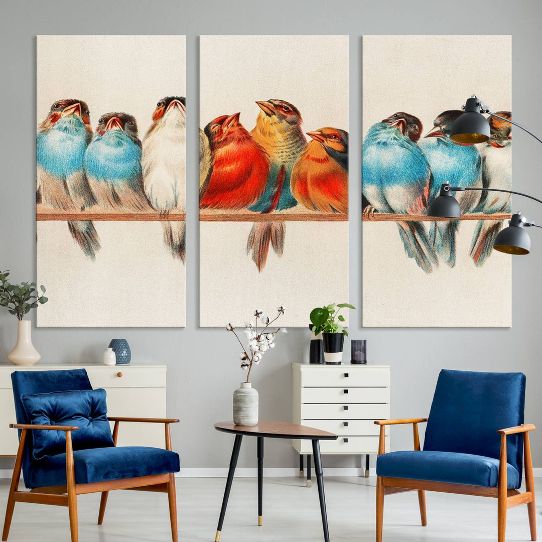 The Abstract Birds Wall Art Canvas Print, featuring a triptych of colorful birds perched on a branch, is printed on museum-quality canvas and equipped with a UV-protective coating and ready-to-hang design. This artwork adds vibrant elegance to your living space.