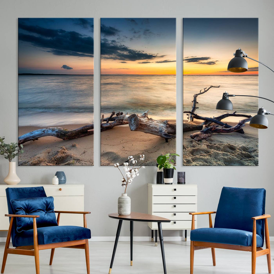 A captivating piece of Ocean Sunset Beach Wall Art Canvas Print, gallery wrapped, graces the gray wall.