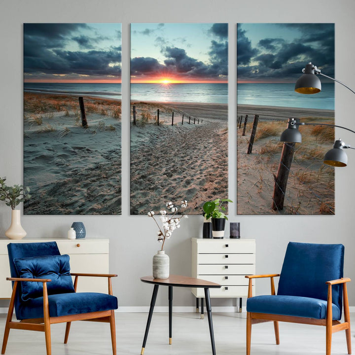 The modern living room features the Cloudy Weather Sunset Beach Wall Art Canvas Print. This museum-quality canvas adds a touch of sophistication with its hand-assembled framed art, ensuring lasting elegance. Enjoy free shipping on this exquisite piece.