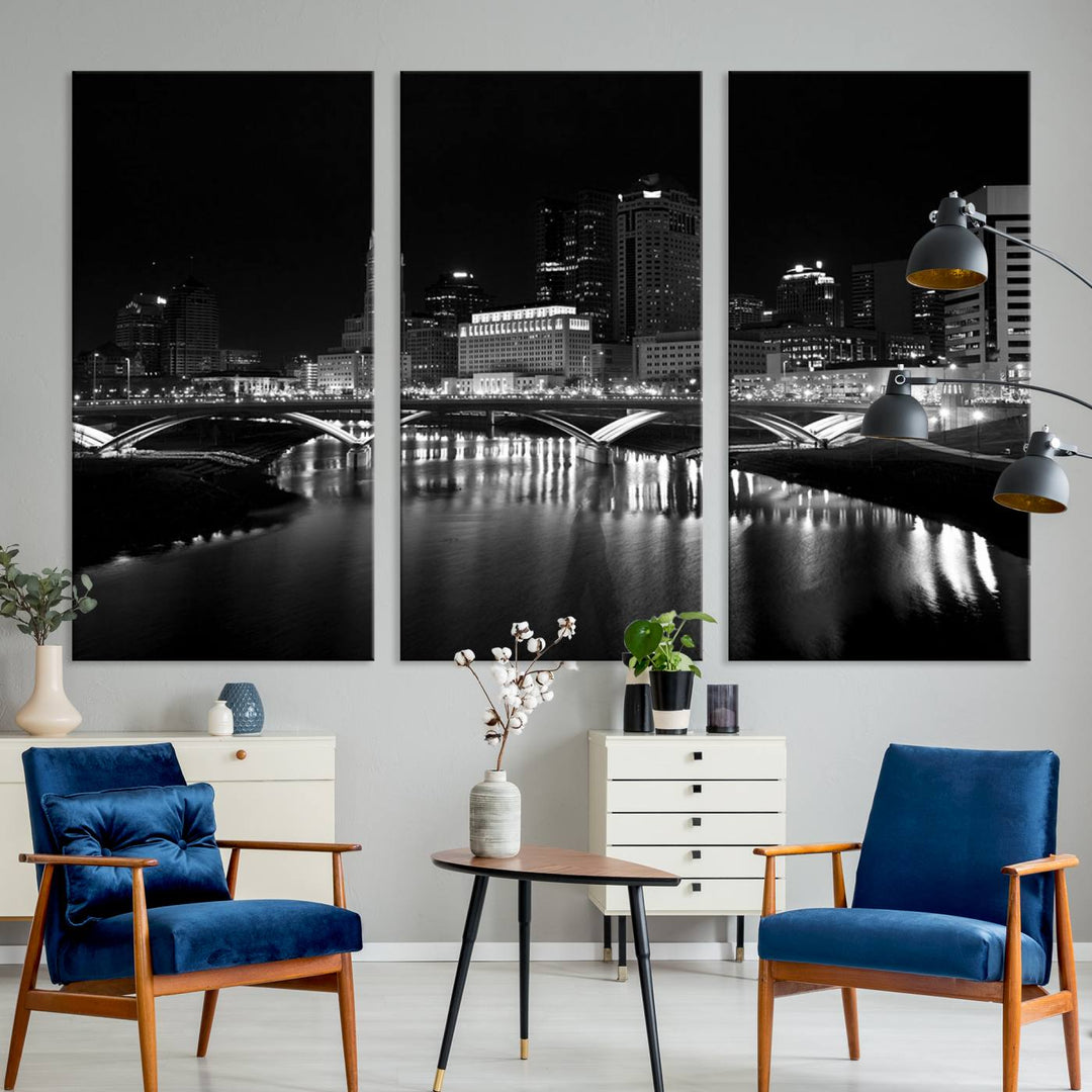 The living room features the "Columbus City Lights Skyline Black and White Wall Art Cityscape Canvas Print" above a coffee table. This artwork is presented as a triptych on museum-quality canvases with UV-protective coating.