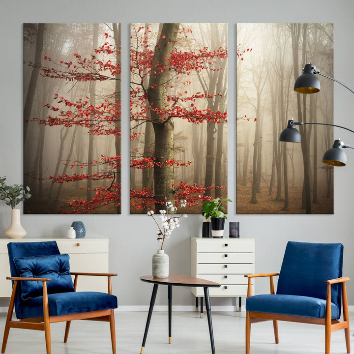 The living room features the Foggy Forest Wall Art, an Autumn Trees Canvas Print that showcases a serene nature scene with foggy woodland decor and a tree adorned in vibrant red leaves.