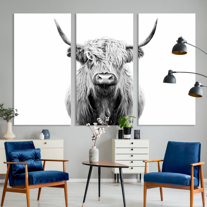 The wall art features a triptych of a Scottish Highland cow, printed on museum-quality canvases with a UV-protective coating. This decorative piece is known as the Highland Cow Canvas Wall Art Farm House Wall Art.