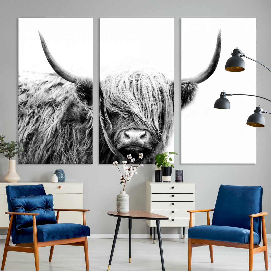 A museum-quality triptych titled "Black White Scottish Highland Cow Cattle Art Print Farmhouse Wall Art Canvas Print" embellishes the dark wall. The canvas is equipped with a UV-protective coating to ensure lasting vibrancy.