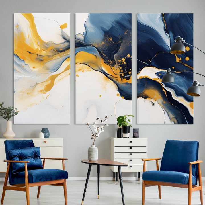 The Blue and Gold Abstract Fluid Canvas Art, with its swirling patterns, adorns the wall. This modern wall art beautifully complements the contemporary interior decor, adding an elegant touch with its rich blue, gold, and white tones.