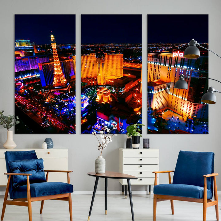 Las Vegas Wall Art Canvas Print showcases a dynamic and luminous cityscape at night with tall buildings and bustling streets. Expertly printed on museum-quality canvas, this gallery-wrapped artwork is enhanced with a UV-protective coating to ensure lasting brilliance.