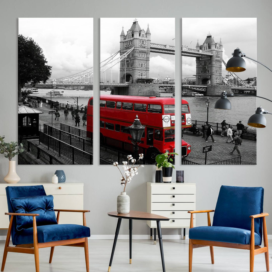 The London Red Bus and Bridge Wall Art Canvas Print showcases a red London bus in front of Tower Bridge, beautifully presented as a gallery-wrapped canvas. This striking image is divided into three panels, delivering a museum-quality display that's ready to hang.