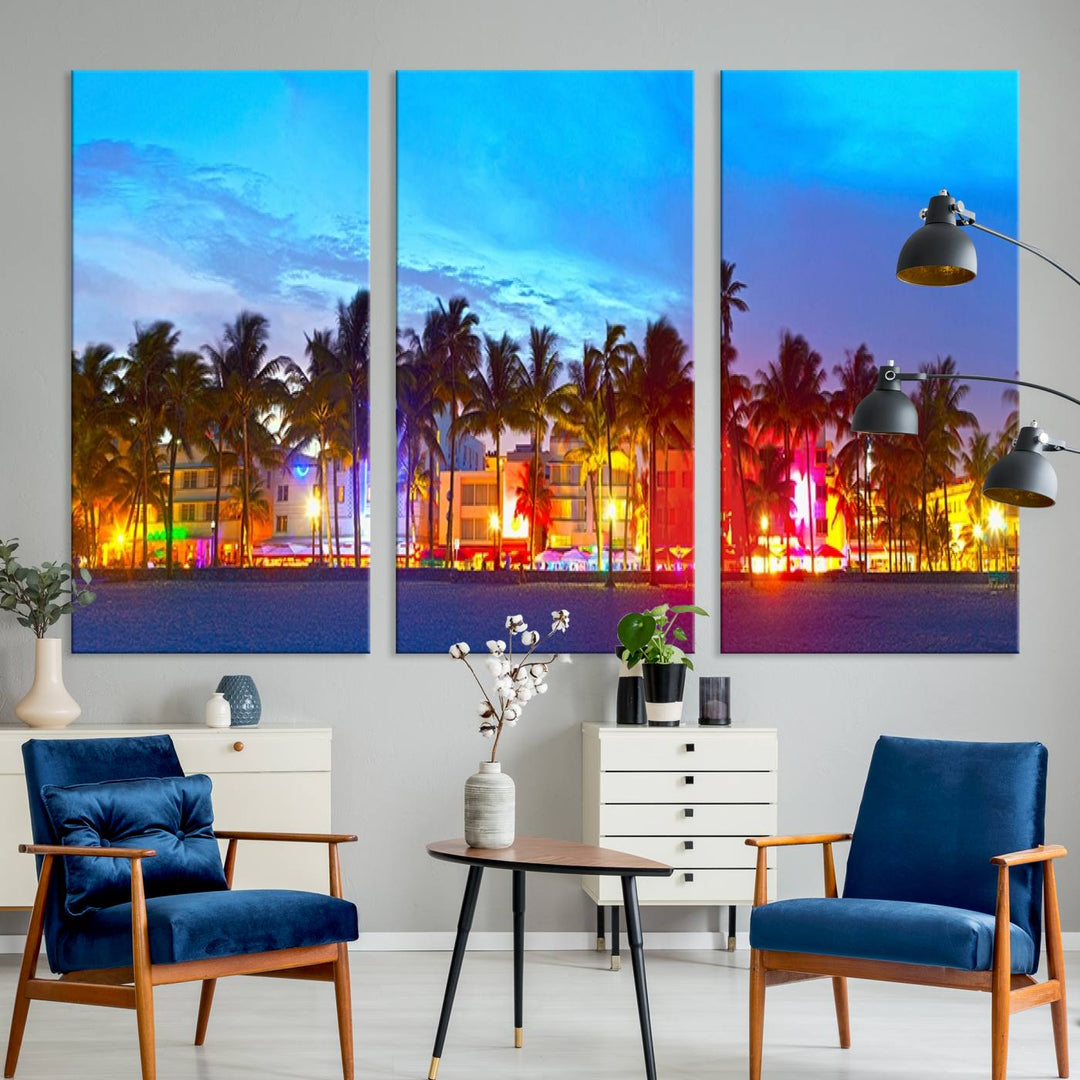 The living room features a three-panel Miami City Wall Art Canvas Print, showcasing a colorful, illuminated beach scene with palm trees on museum-quality canvas.