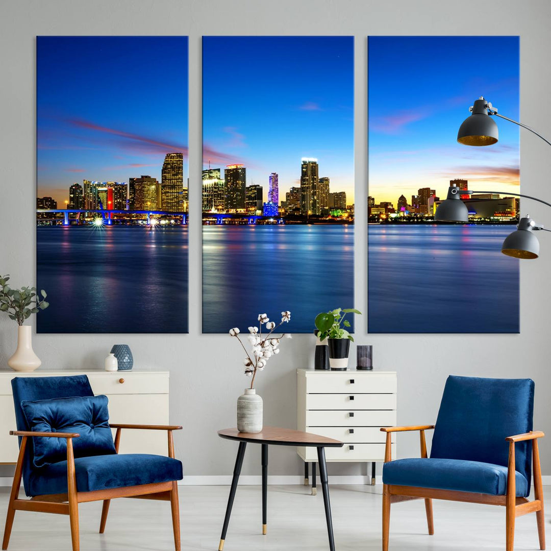 The living room features a Miami City Wall Art Canvas Print—a gallery-wrapped triptych displaying a city skyline at dusk, adding museum-quality elegance to the space.