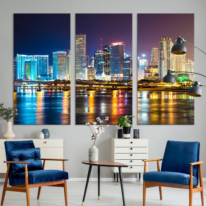 A stunning Miami City Wall Art Canvas Print on museum-quality canvas depicts a vibrant cityscape at night with colorful reflections.