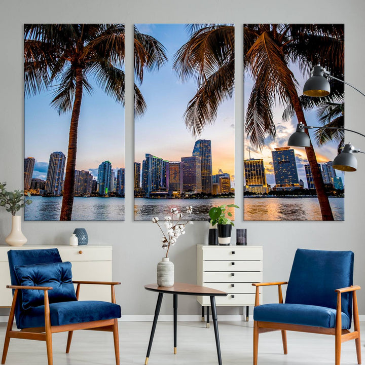 The Wall Art MIAMI Canvas Print features a triptych design depicting palm trees and a city skyline at sunset.