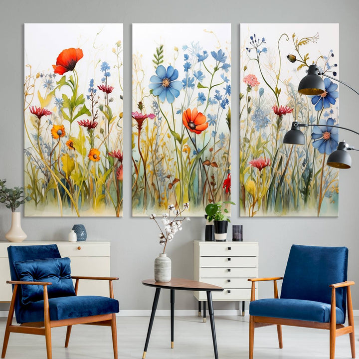 The Colorful Wildflower Canvas Wall Art – Vibrant Floral Botanical Print, consisting of a large 3 panel set, adds bright nature decor to the living room against a black wall.