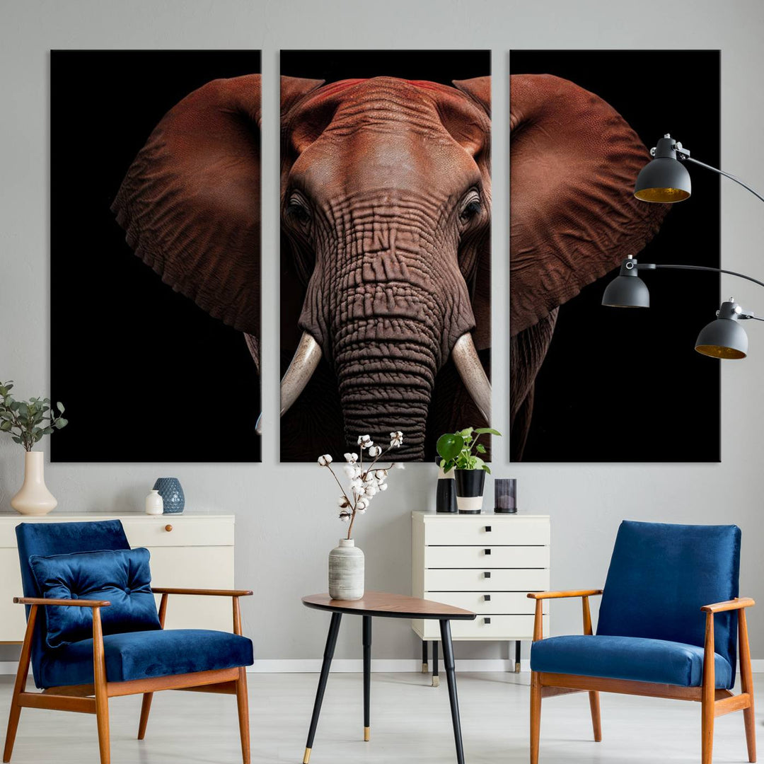 A stunning triptych titled "Wild Elephant Wall Art Canvas Print" beautifully enhances the wall above a contemporary living room. This Africa Savannah Wild Animal Wall Decor Print is of museum-quality, complete with a UV-protective coating to ensure its vibrancy and beauty are preserved for years.