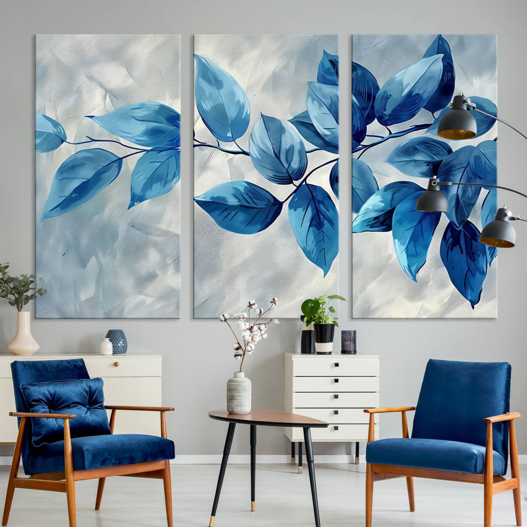 A Blue Leaf Abstract Wall Art Canvas Print, featuring a textured background and gallery-quality finish, is displayed.