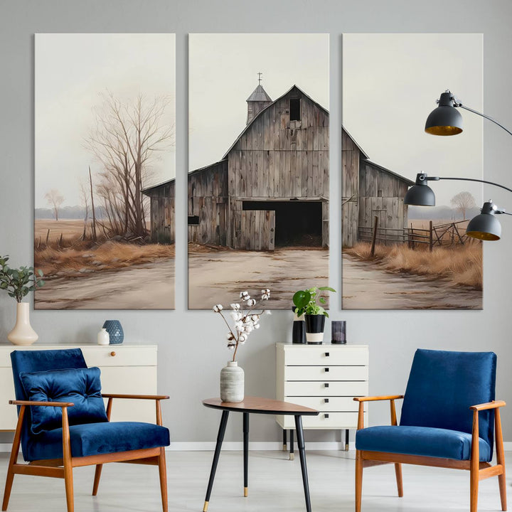 A framed and ready-to-hang Farmhouse Rustic Barn Wall Art Canvas Print is displayed against a gray wall. This stylish modern living room seamlessly combines rural life wall décor with contemporary comfort.