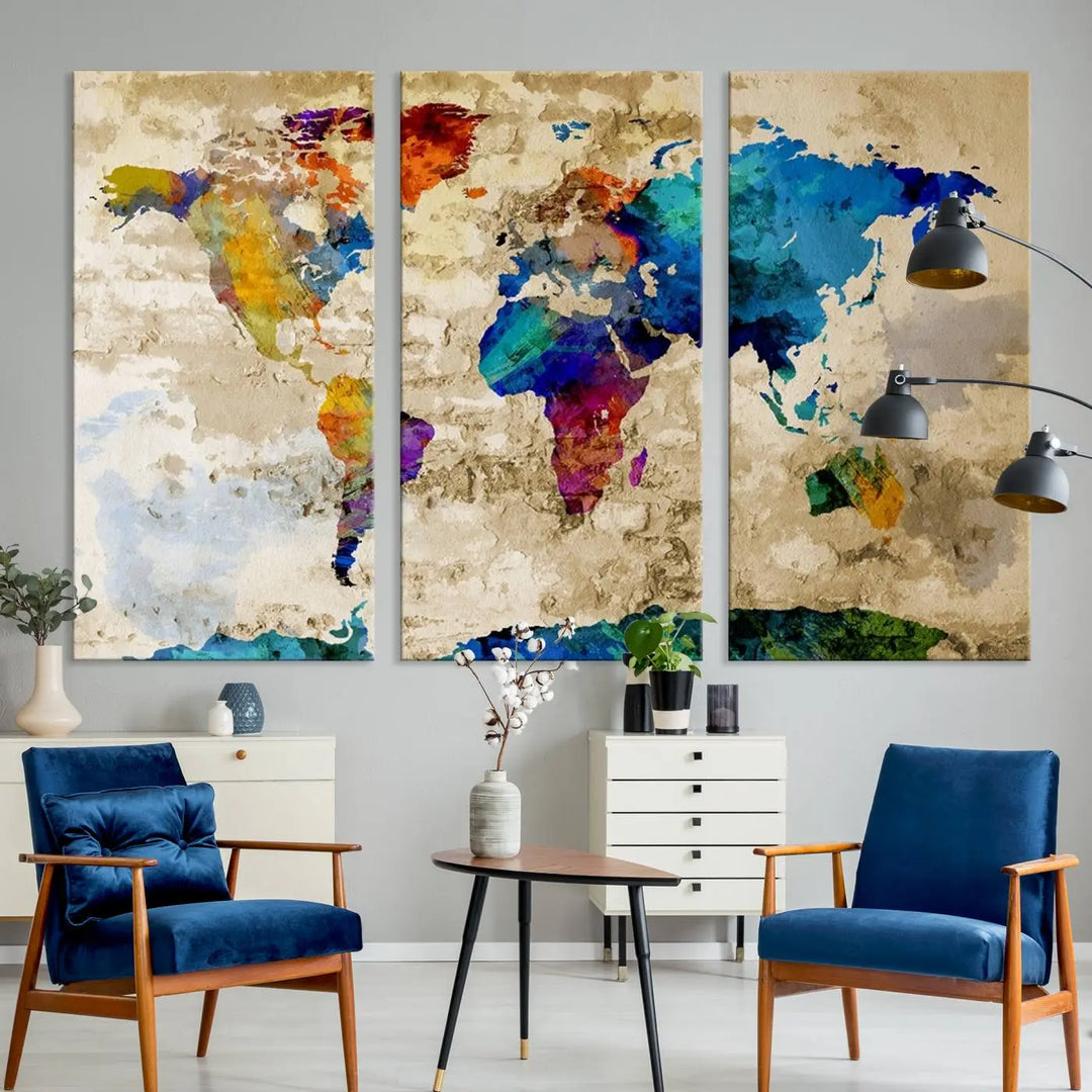 The "Watercolor World Map Canvas Print" art piece hangs above the cabinet in this stylish room. Printed on gallery-wrapped, museum-quality canvas with a UV-protective coating, this artwork adds an elegant touch to the space.