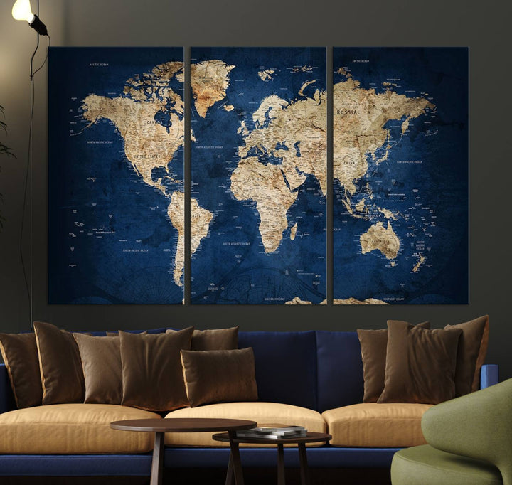 A triptych canvas print titled "Vintage Blue World Map Canvas Print - Classic World Map Design on Deep Blue Wall Art Print" adorns the wall, enhancing the decor with its antique style.