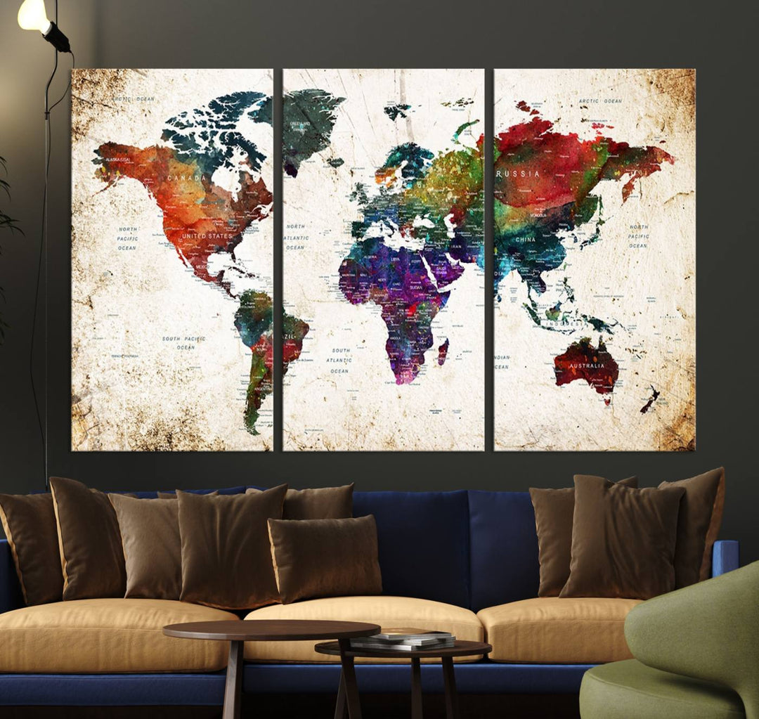 The wall is adorned with the Vintage World Map Wall Art Print, featuring a vibrant cartographic design.