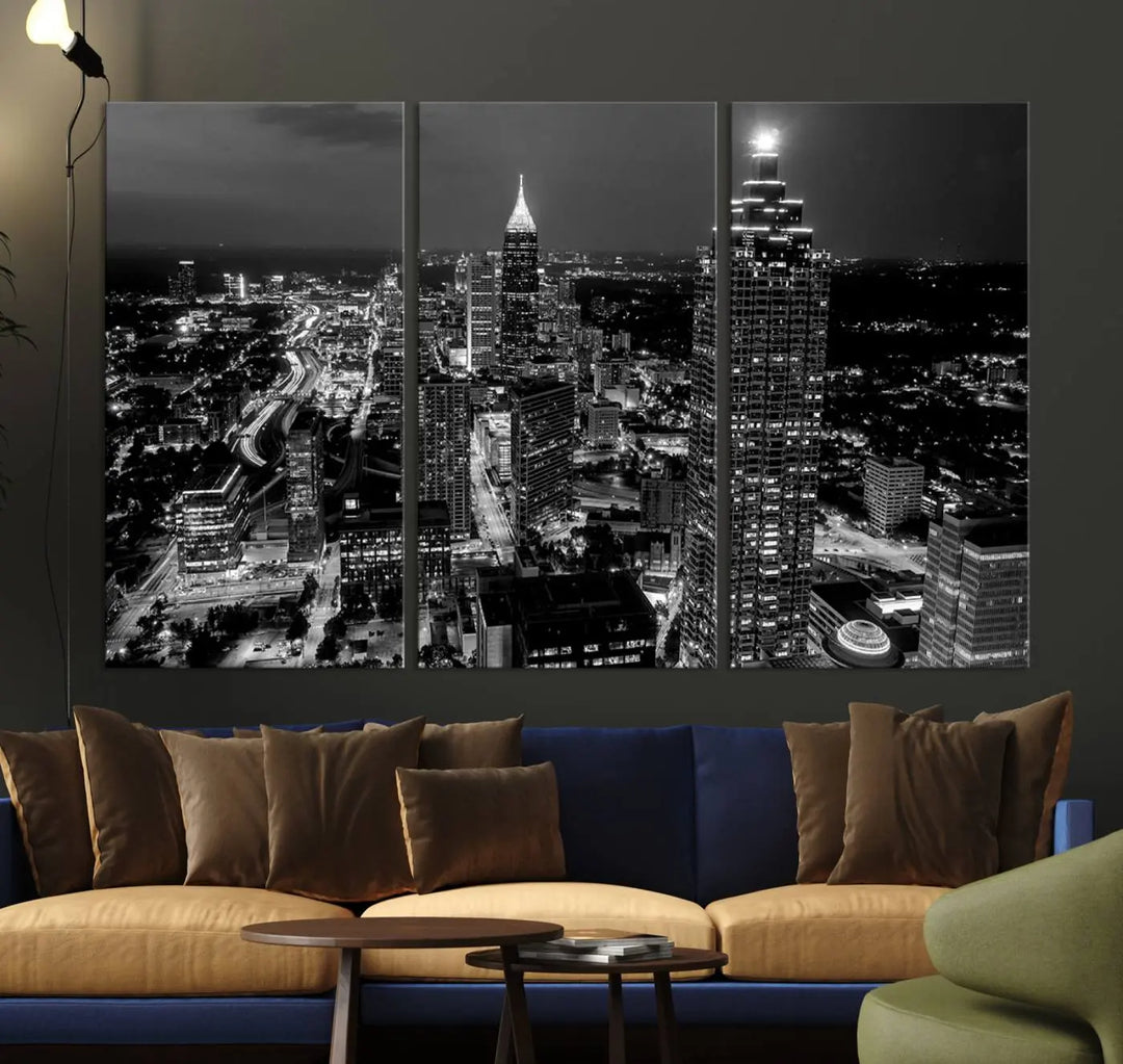 The Atlanta City Lights Skyline Black and White Wall Art Cityscape Canvas Print is elegantly displayed on the wall. These museum-quality canvases arrive ready to hang, making your art display both effortless and sophisticated.