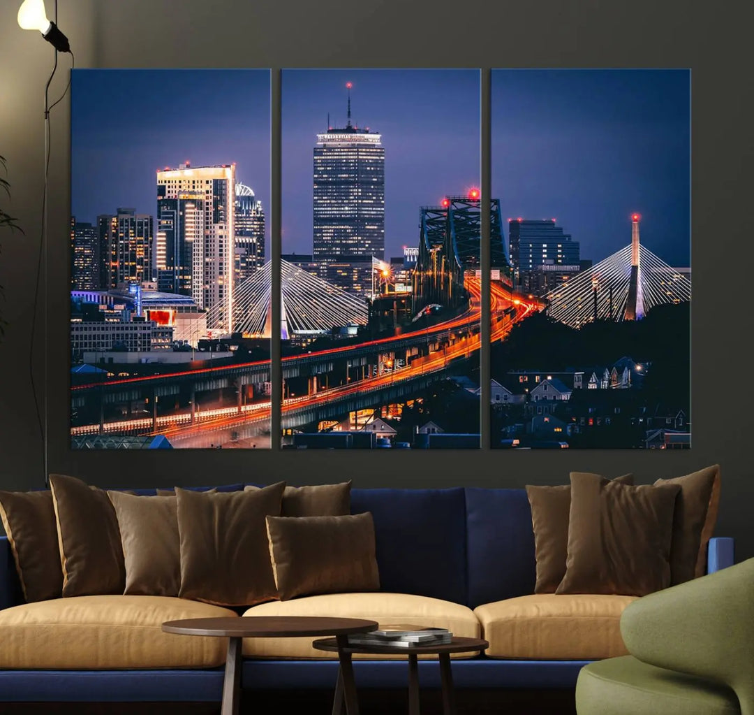 The "Boston City Lights Night Skyline Cityscape View" artwork on the wall showcases a brightly lit bridge at night. It is displayed on museum-quality canvas with a UV-protective coating.