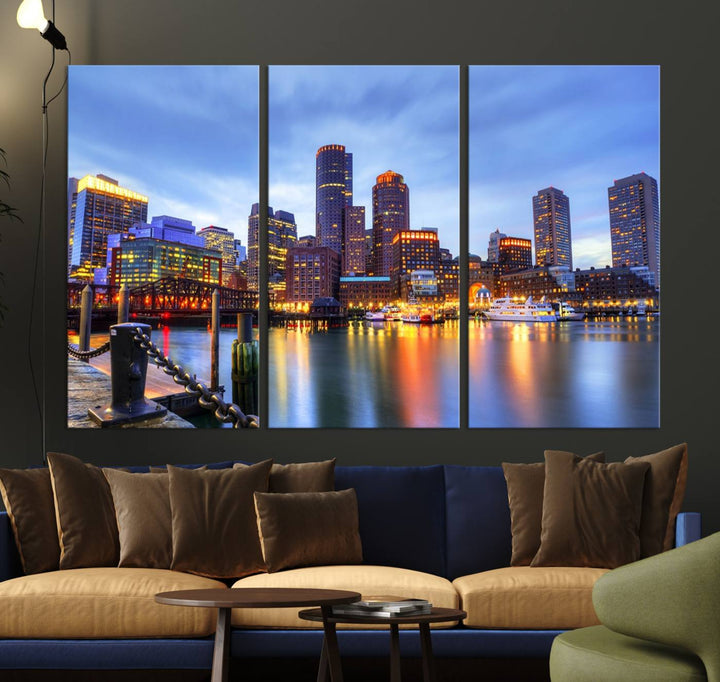 The Boston City Lights Sunset Cloudy Blue Skyline Cityscape View Wall Art Canvas Print embellishes a contemporary living room. This gallery-wrapped canvas set guarantees museum-quality canvases to enhance any space.