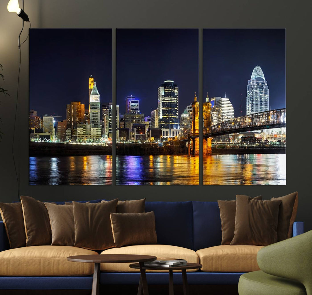 The Cincinnati City Lights Night Skyline Cityscape View Wall Art Canvas Print, crafted on museum-quality canvas with UV-protective coating and ready to hang, adds a touch of sophistication to the wall.