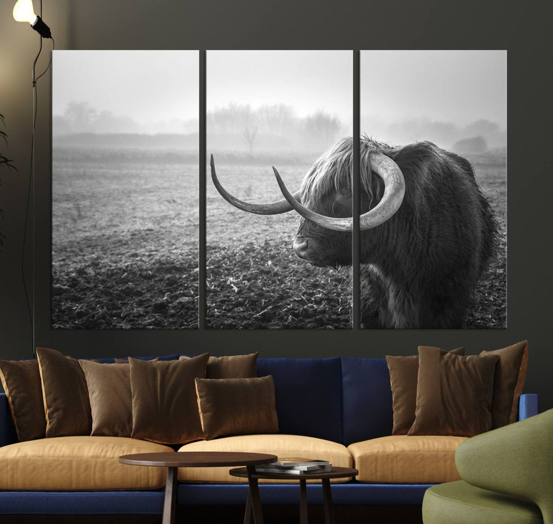 The living room features a three-panel wall art of a highland cow in a foggy field, using the Cow Wall Art Canvas Print for visual impact. This museum-quality canvas includes UV-protective coating to ensure longevity.