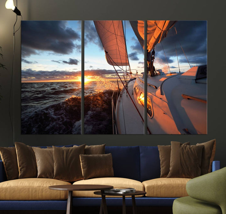 The modern living room is adorned with the Ocean Sunset Sailboat Wall Art, a triptych crafted on museum-quality canvas featuring UV-protective coating for lasting vibrancy.