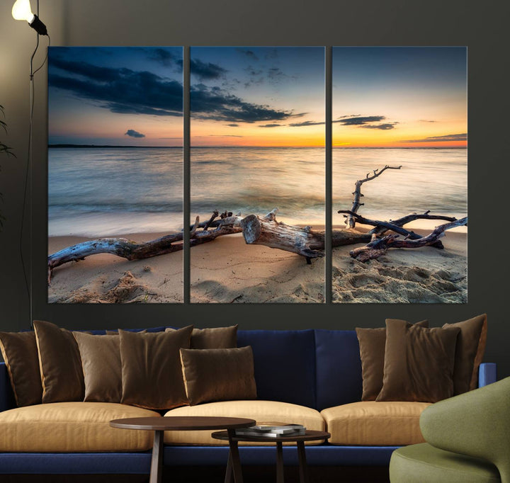 A captivating piece of Ocean Sunset Beach Wall Art Canvas Print, gallery wrapped, graces the gray wall.