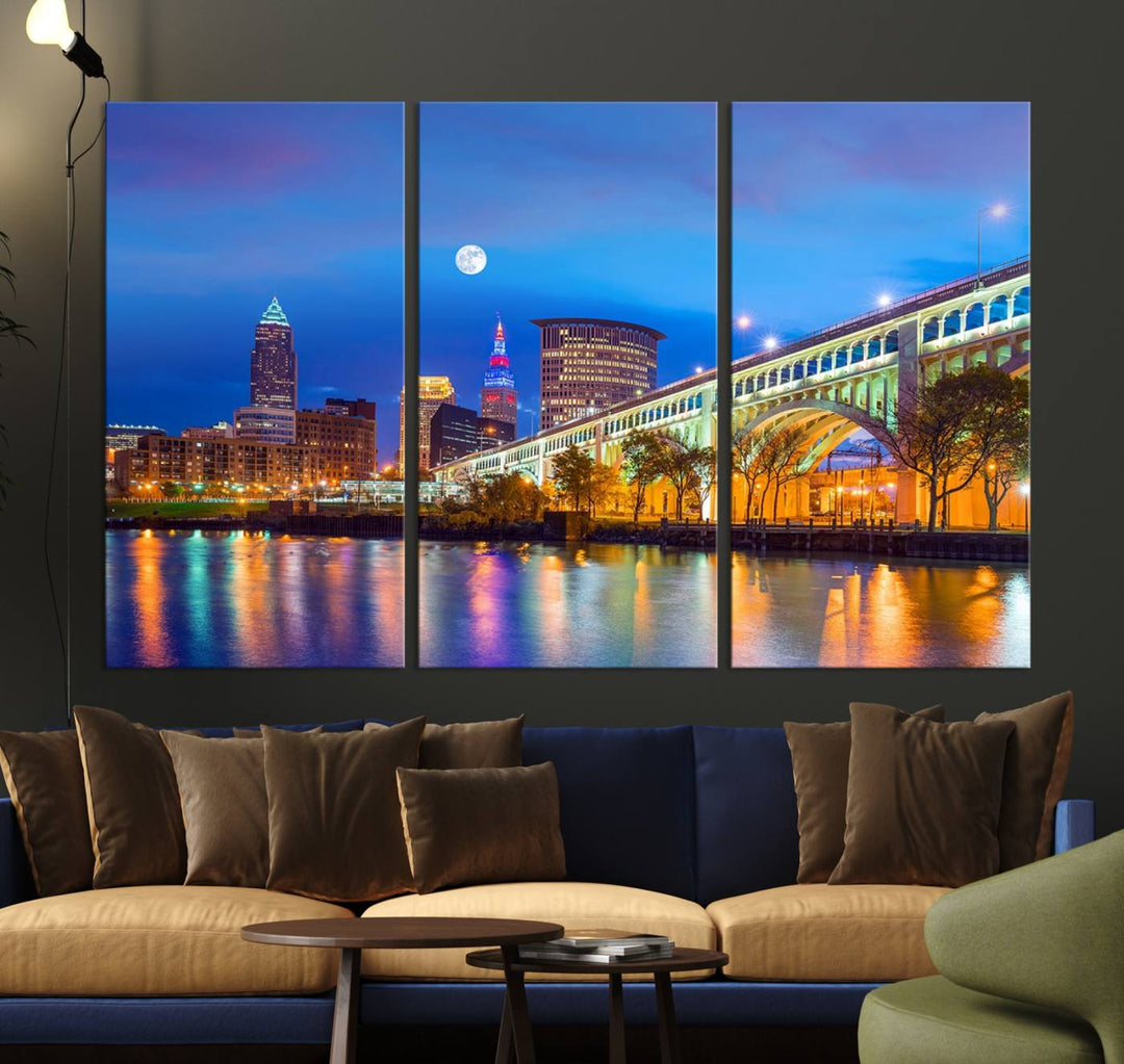 The Cleveland Night Skyline Wall Art City Cityscape Canvas Print portrays a city skyline and bridge lit up against the night sky. This artwork is printed on museum-quality canvas with a gallery-wrapped finish and features a UV-protective coating to ensure lasting vibrancy.