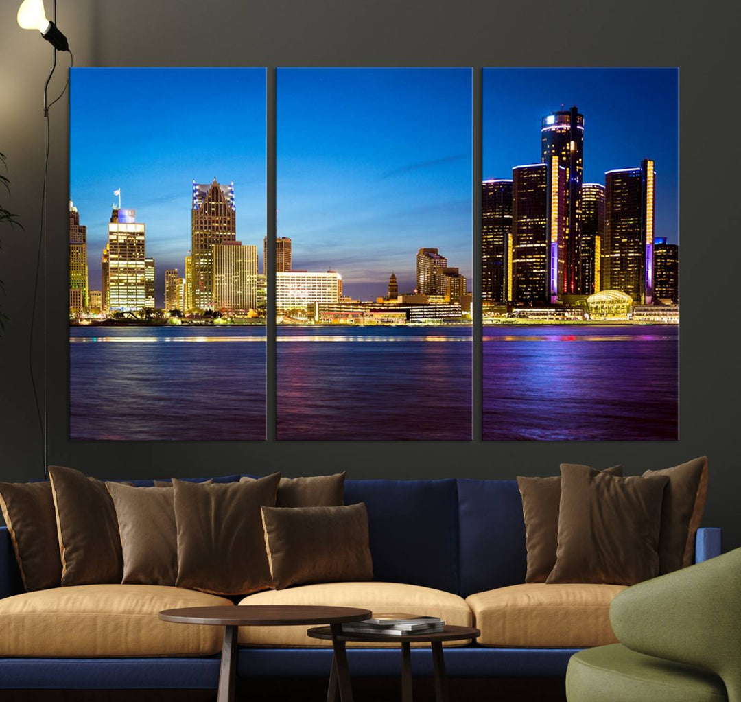 The living room features a breathtaking canvas print titled "Detroit City Lights Night Bright Blue Skyline Cityscape View," presented in a stunning triptych format on museum-quality canvases that are ready to hang.