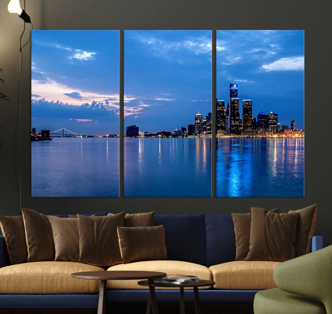 The "Detroit City Lights Night Blue Cloudy Skyline Cityscape View" wall art, displayed on museum-quality canvases, is split into three gallery-wrapped panels.