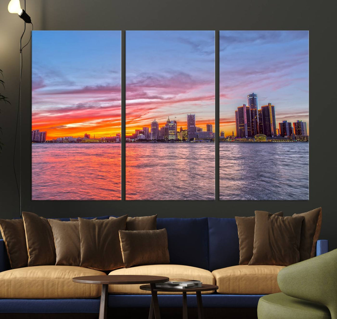 The Detroit City Lights Sunset Colorful Cloudy Skyline Cityscape View Wall Art Canvas Print showcases a vibrant city skyline at sunset over water. The artwork is museum-quality, comes ready to hang, and features a UV-protective coating to preserve its vivid colors.