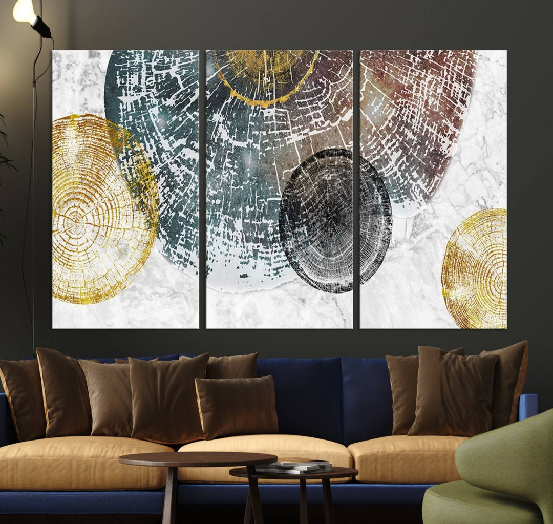 Contemporary living room showcasing the "Wood Lines" 3 Panel Abstract Wall Art Canvas Print displaying museum-quality tree ring art on the wall.