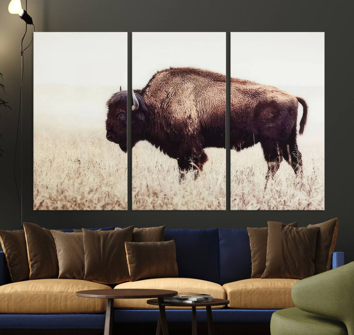 A stylish living room showcases the captivating "Bison in Field" Wall Art Canvas Print as farmhouse decor.