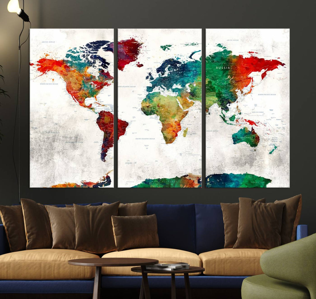 The Colorful World Map Triptych Canvas Print, a vibrant and modern ready-to-hang framed wall art, adorns the wall, offering an artistic touch to the space.