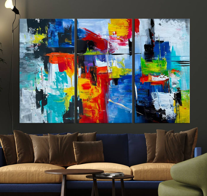 Three Colorful Abstract Wall Art Canvas Prints feature vibrant colors on museum-quality canvas and are finished with a UV-protective coating. Their ready-to-hang design allows for effortless transformation of your space.