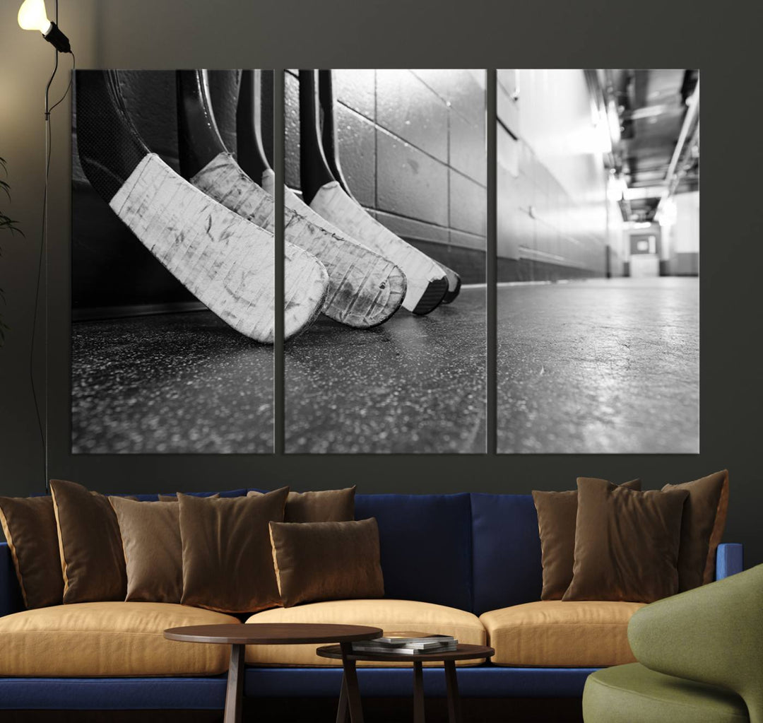 A living room featuring a large Ice Hockey Wall Art Canvas Print on gallery-wrapped canvas.