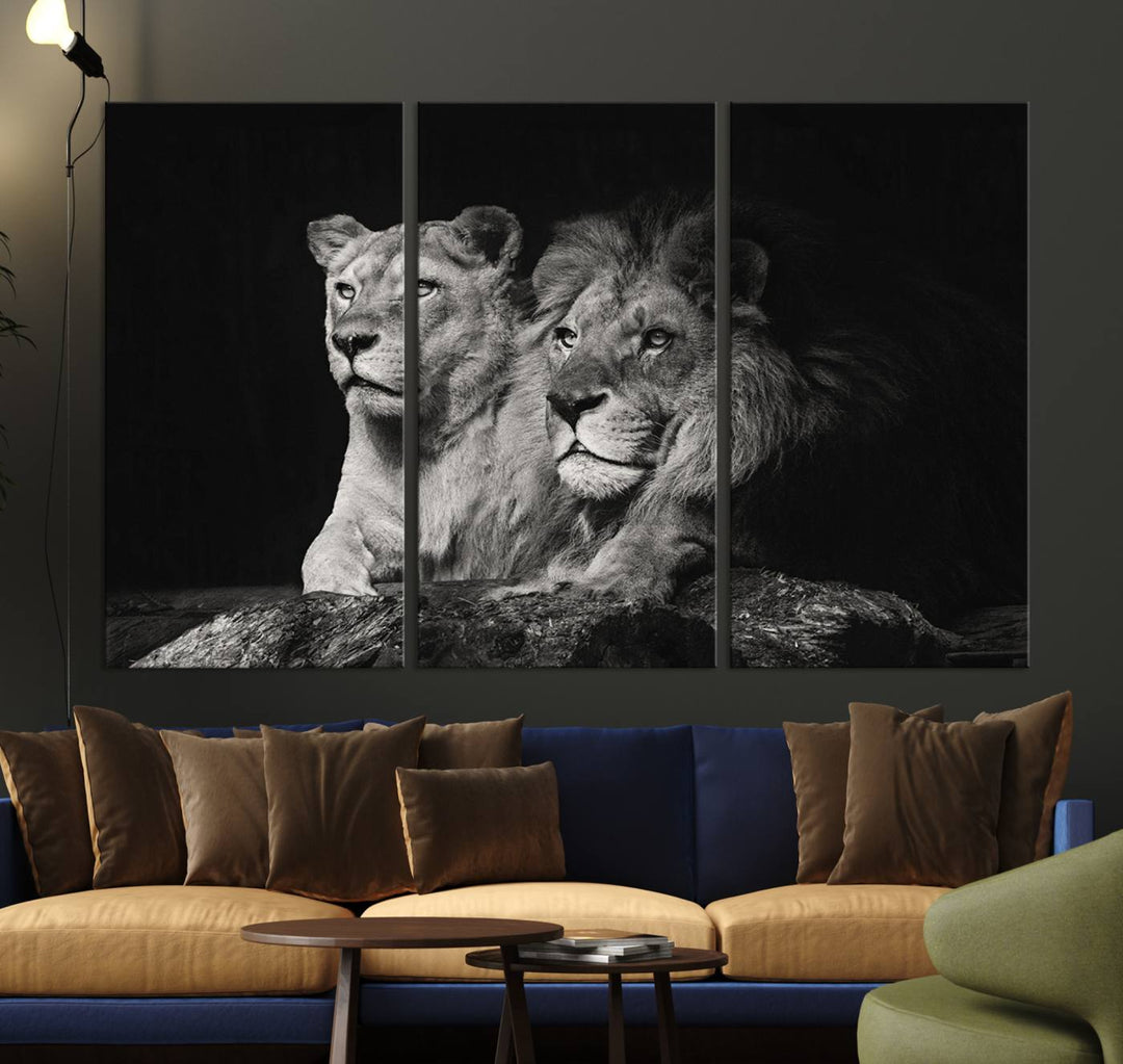 The elegant wildlife portrait, "Lion Couple Canvas Wall Art Print," featuring a black and white depiction of a lion family, majestically decorates the living room wall.